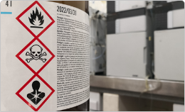 Flammable liquid being stored securely with correct dangerous goods labels.